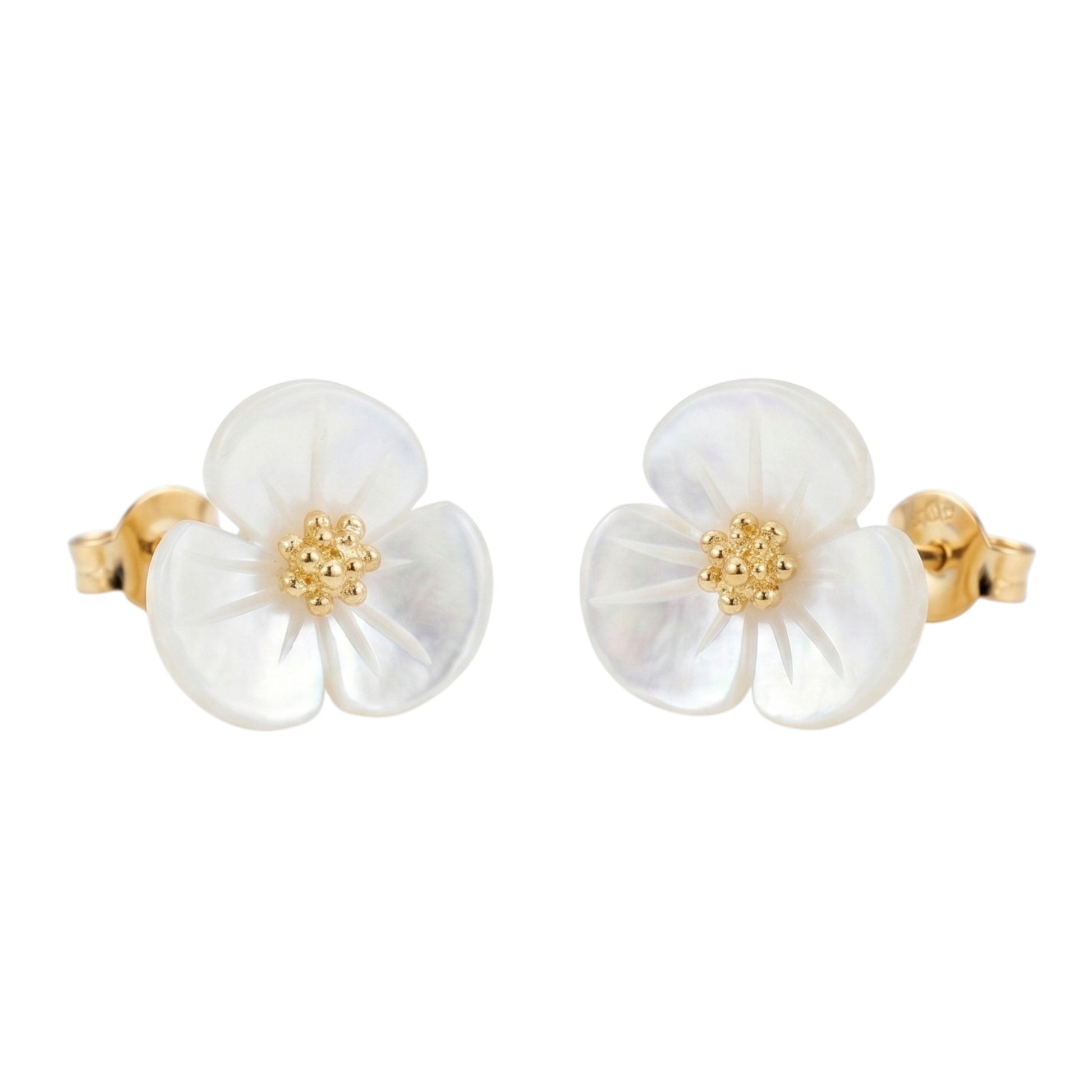 White flower stud earrings with gold-tone center and gold-tone backs, pair view