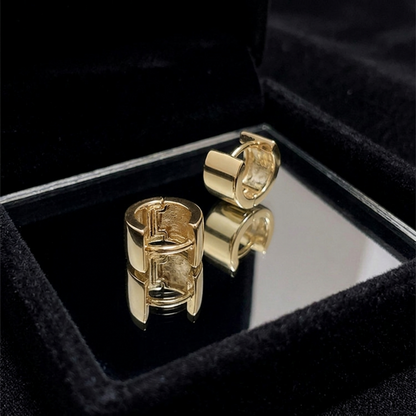 Gold 4.5mm sterling silver hoop earrings with hinged clasp, pair shown.