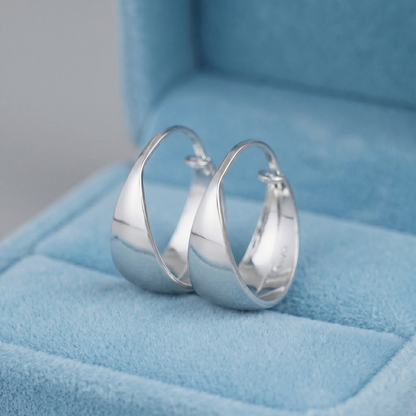 Wide Dome Huggie Earrings with secure post-back, silver-tone dome hoop