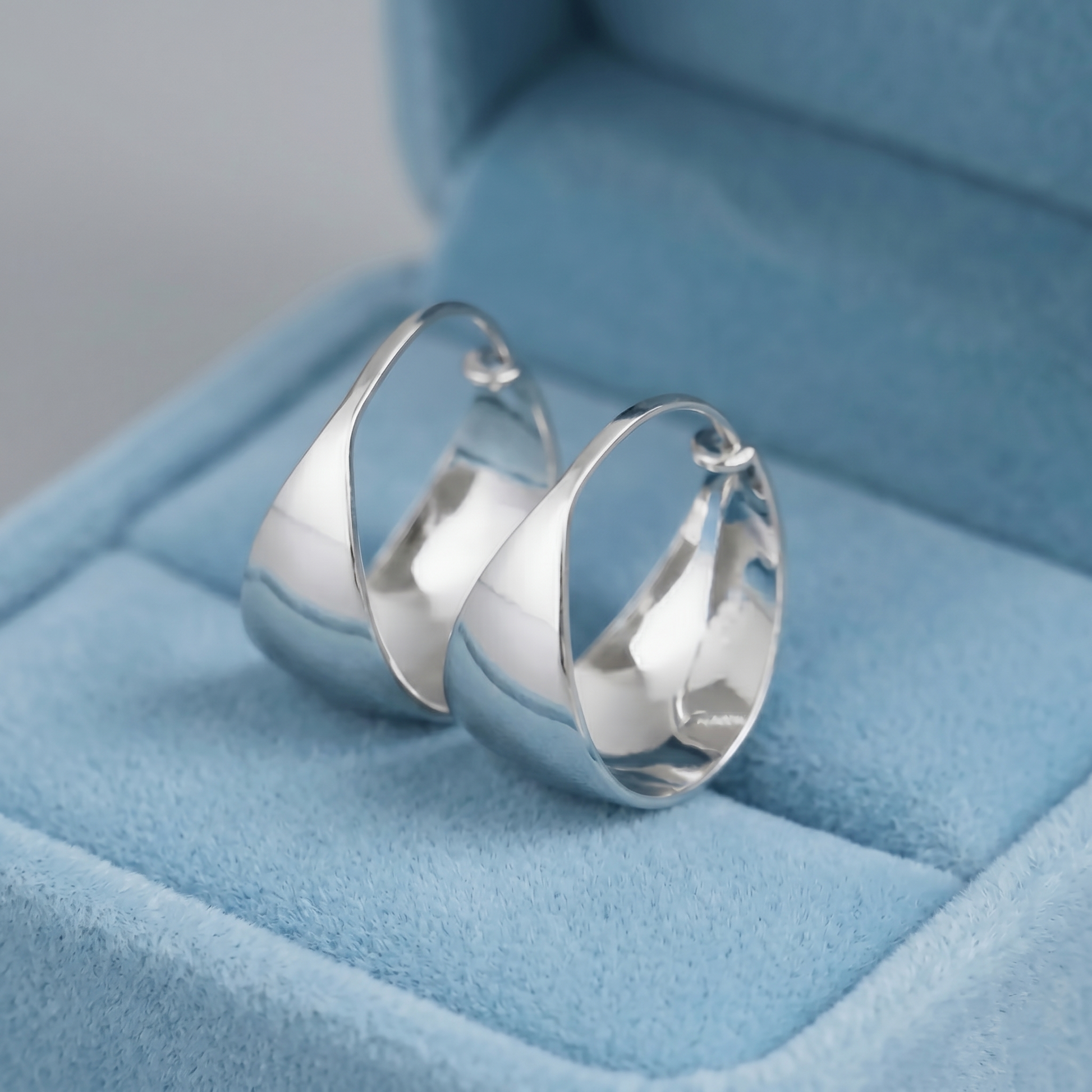 Wide Dome Huggie Earrings in silver-tone, thick rounded dome hoop profile