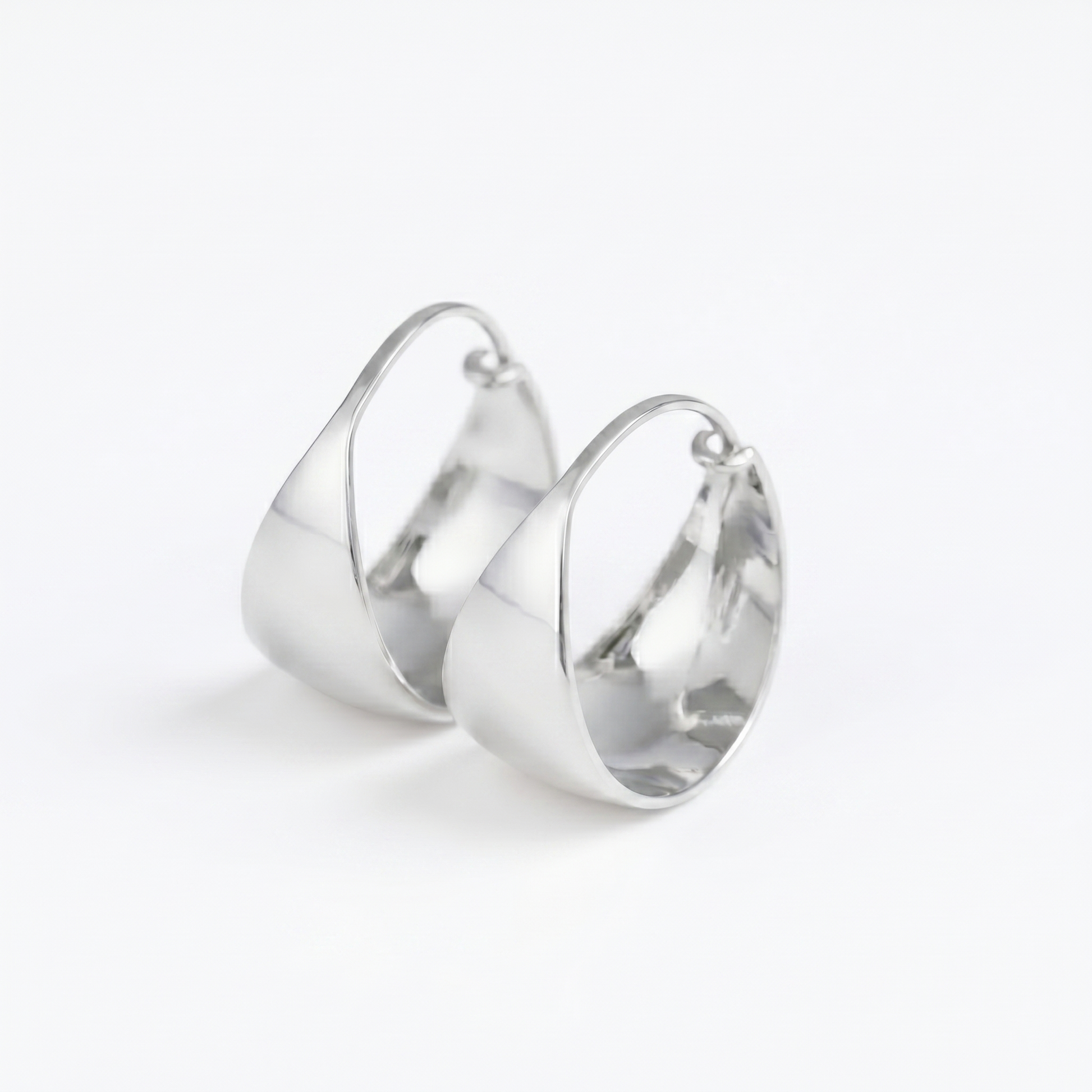 Wide Dome Huggie Earrings, polished silver-tone oval hoop style