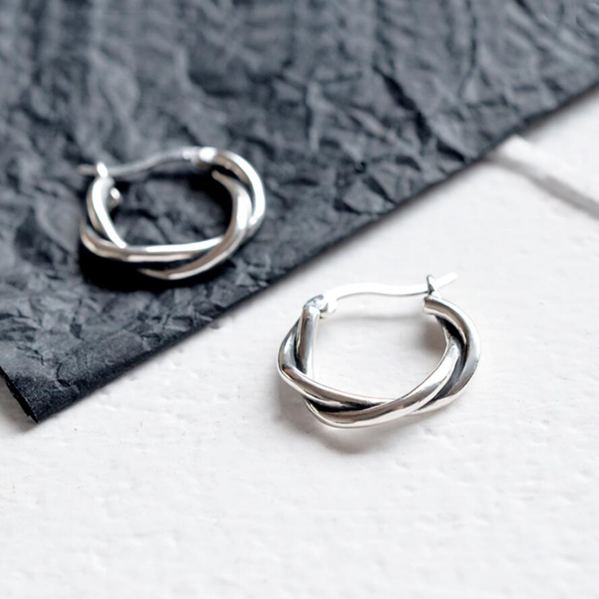 19mm Sterling Silver Oxidized Twist Hoop Earrings with Knot Detail - sugarkittenlondon