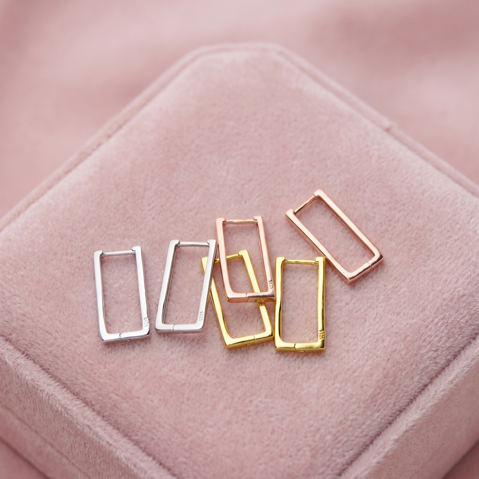 Geometric rectangle huggie earrings in mixed gold, rose gold, and silver tones