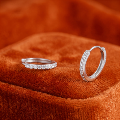 Silver Contrast Huggie Hoops with a row of clear crystals around the hoop