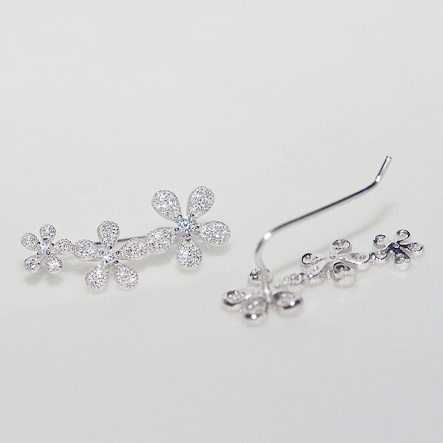 925 Sterling Silver Cuff Drop Earrings with Paved CZ Flowers - sugarkittenlondon