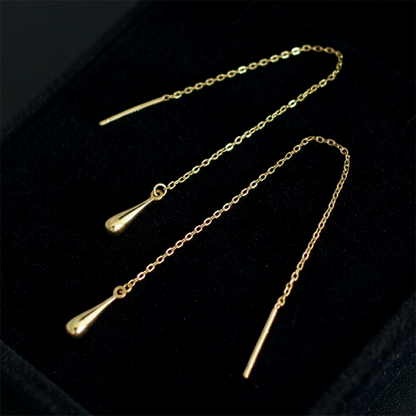 Gold-tone teardrop threader earrings with teardrop drops and long chain in box