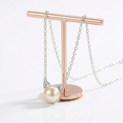 Cat pearl jewelry set with rose gold-tone chain necklace and matching cat-face stud earrings