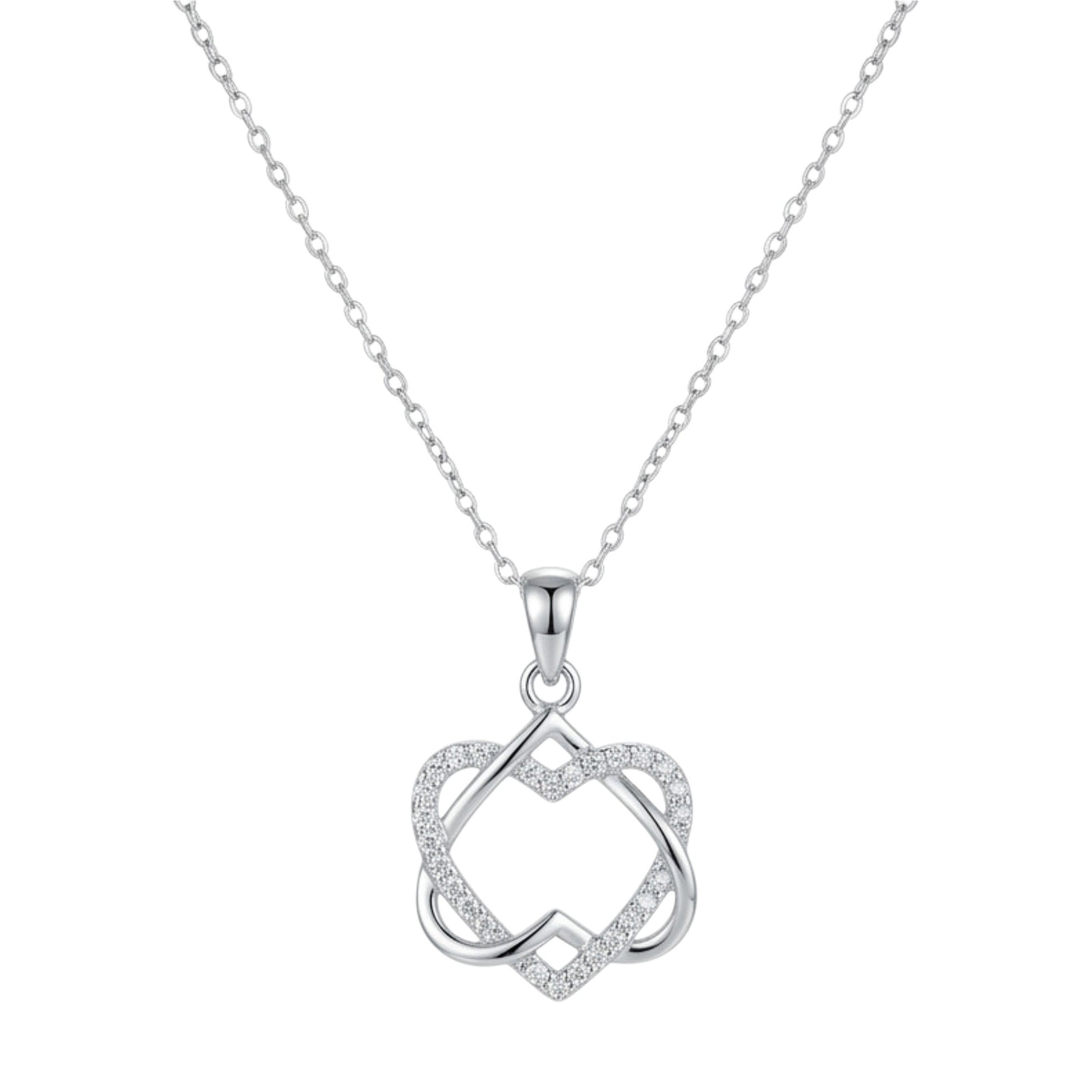 Silver heart knot pendant necklace with small square accents