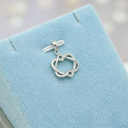 Silver heart knot pendant necklace with linked heart design