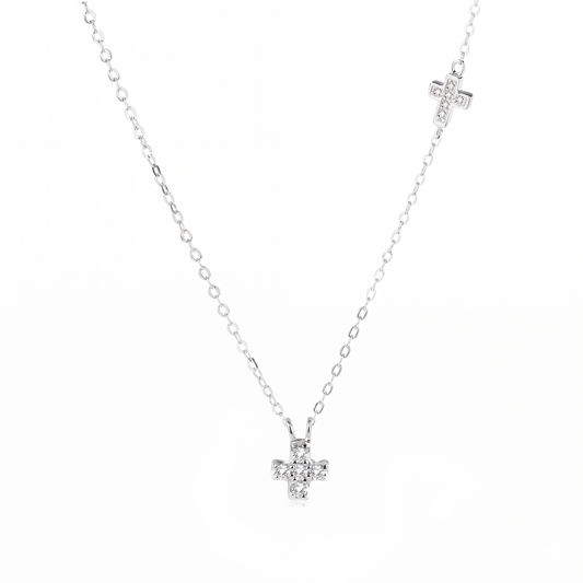 Double sideways cross necklace with two cross pendants and silver-tone chain, clear stones