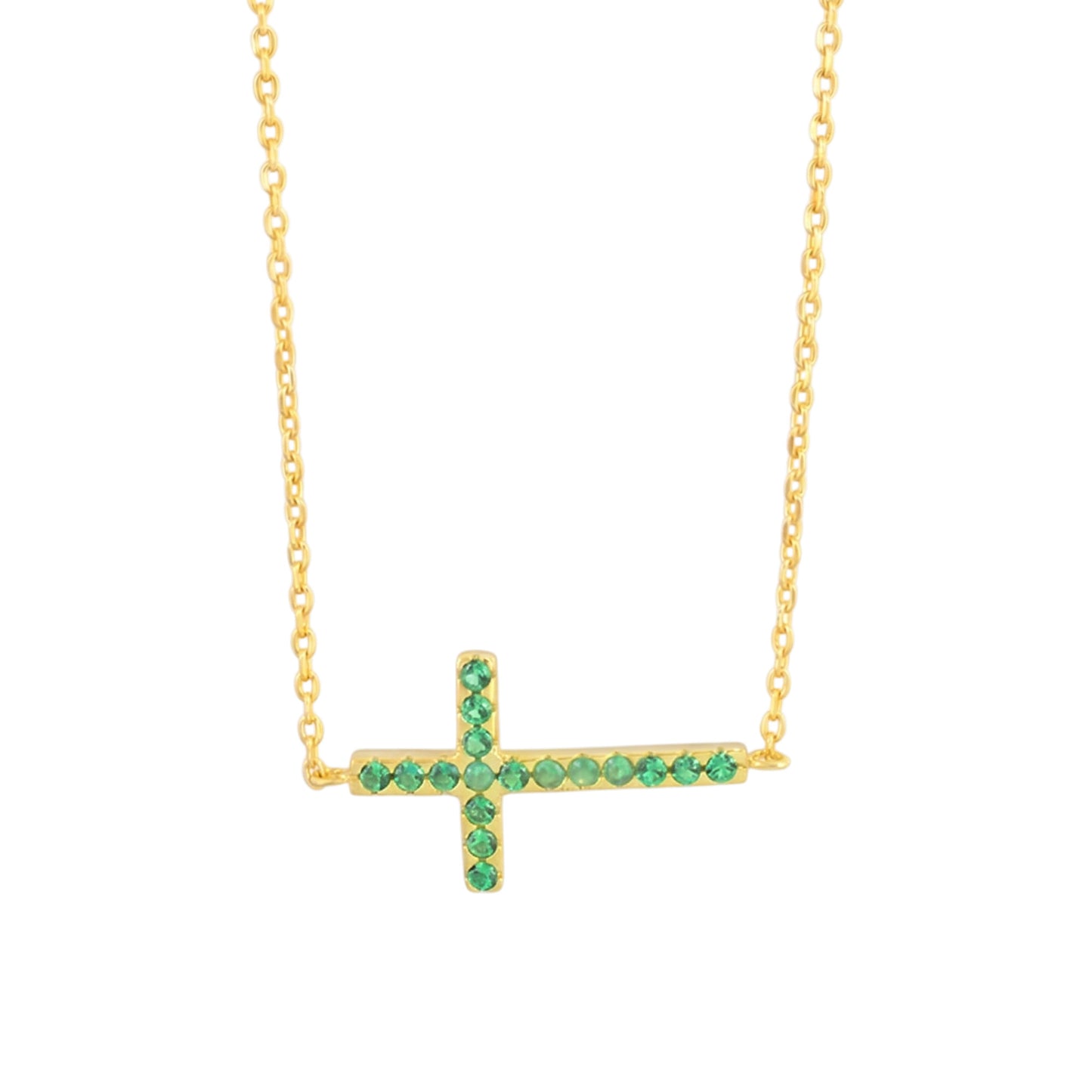 Gold-tone cross necklace with green crystal stones on a fine chain