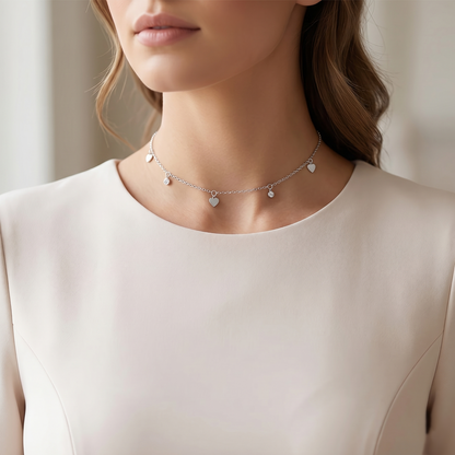 Silver-tone mini heart CZ choker with round CZ discs and heart drops