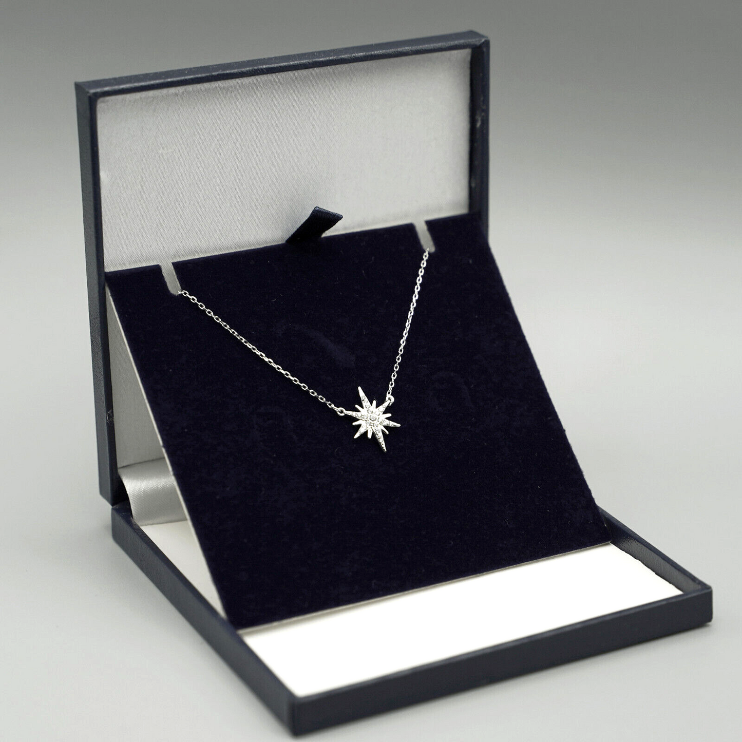 Sterling Silver Rhodium-Plated Sunburst Necklace with CZ Paved Star Charm - sugarkittenlondon