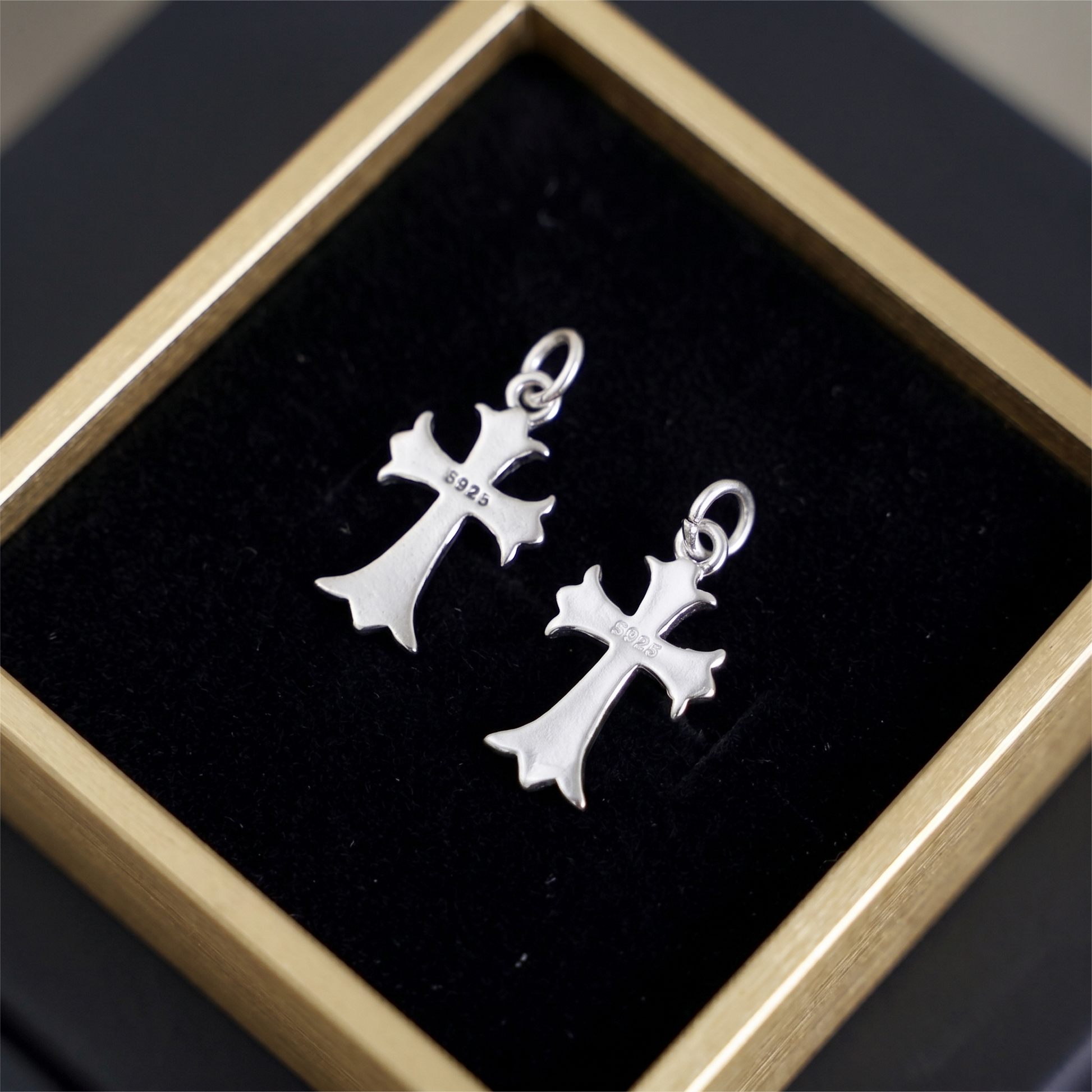 Fleur-de-lis cross charm hook earrings, plain silver pair with stamped details