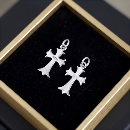 Fleur-de-lis cross charm hook earrings, plain silver pair with stamped details