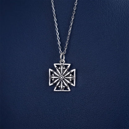 Oxidised Maltese star pendant on silver chain necklace, round center detail