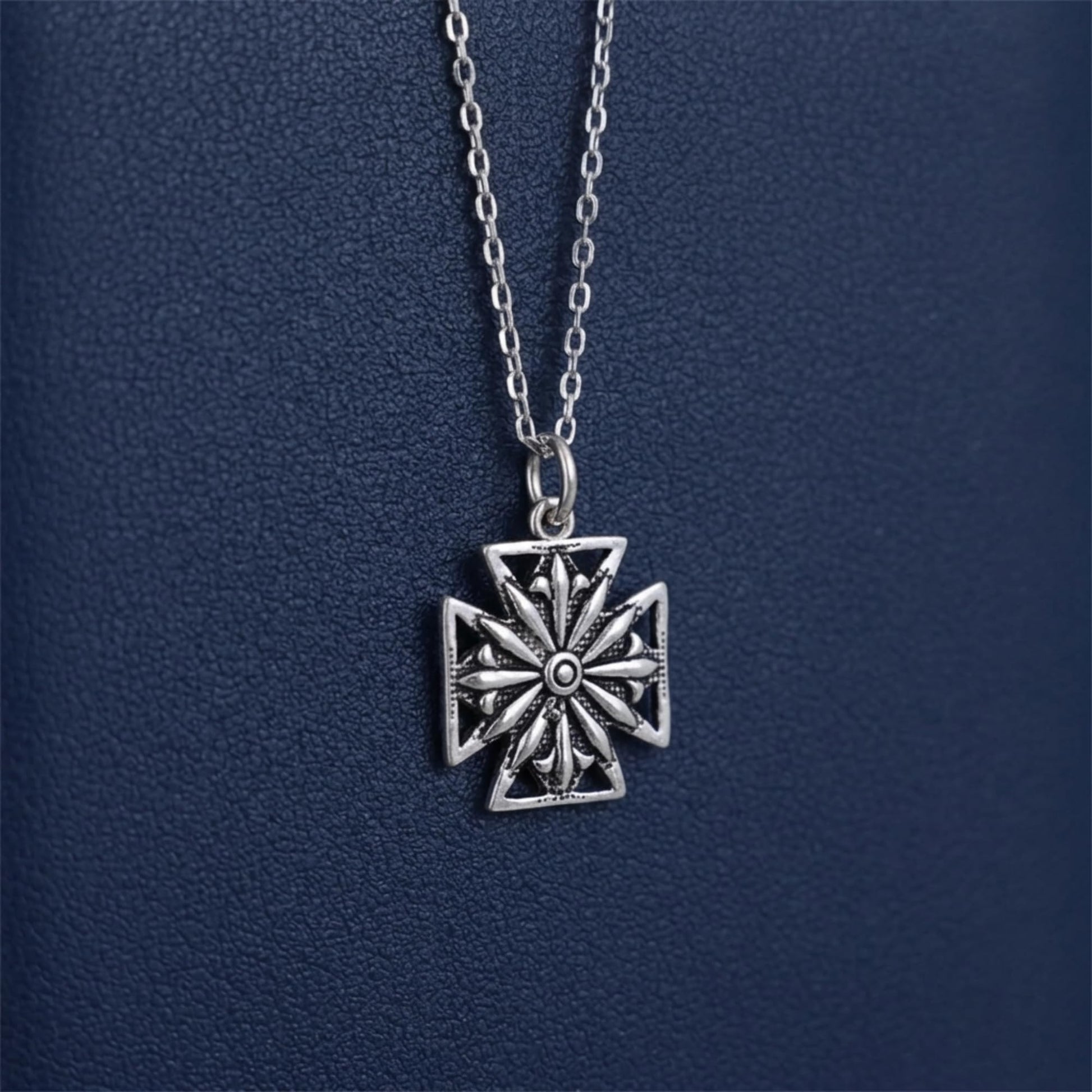 Oxidised Maltese star pendant on hanging silver chain, circular center ornament