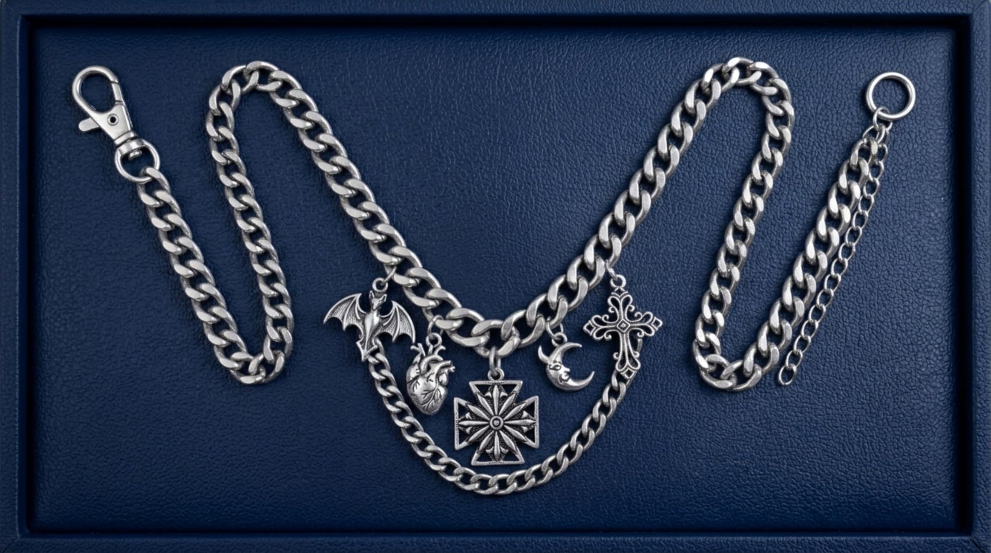 Oxidised Maltese star pendant centered on silver chain necklace, cross-style design