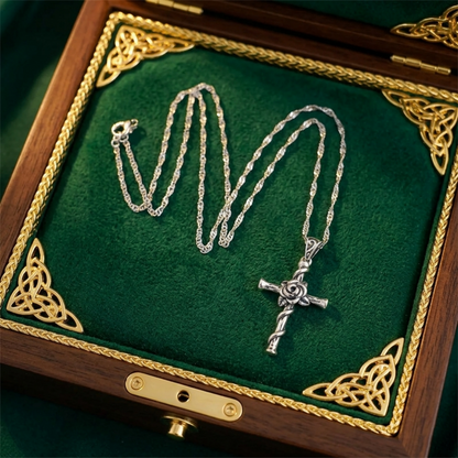 Silver rose thorn cross pendant on a long chain with clasp link