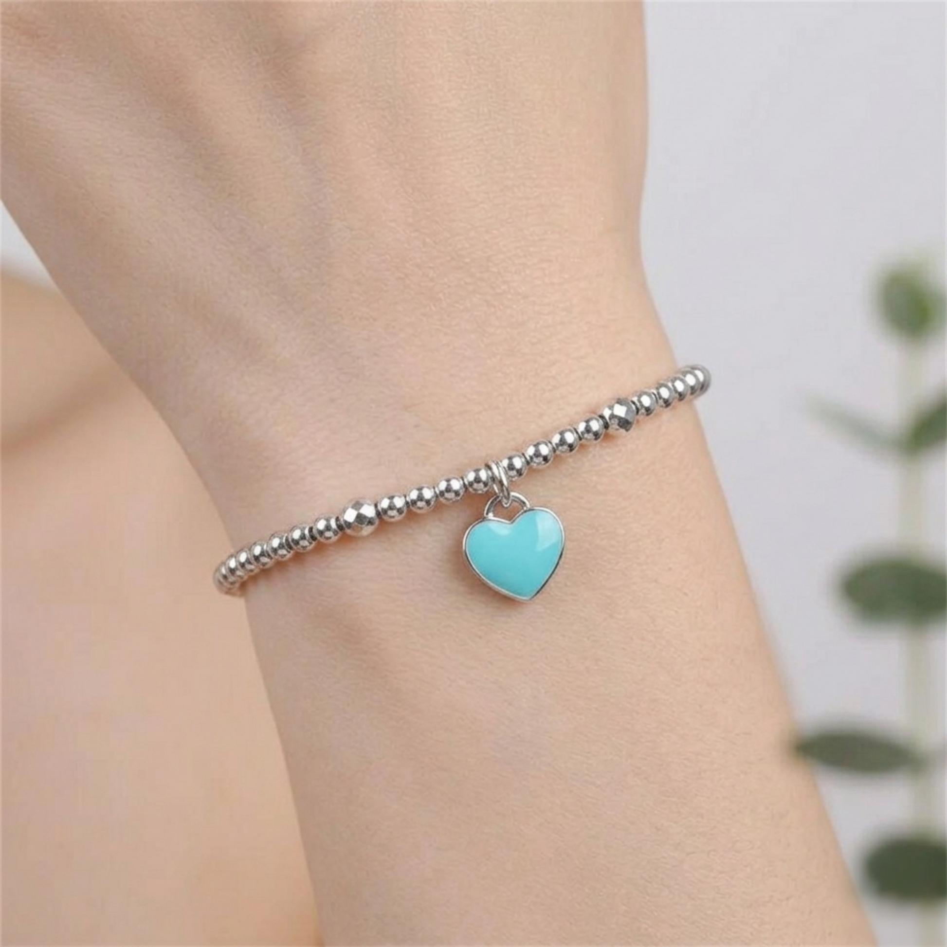 Turquoise heart charm on silver beaded bracelet with small hanging loop