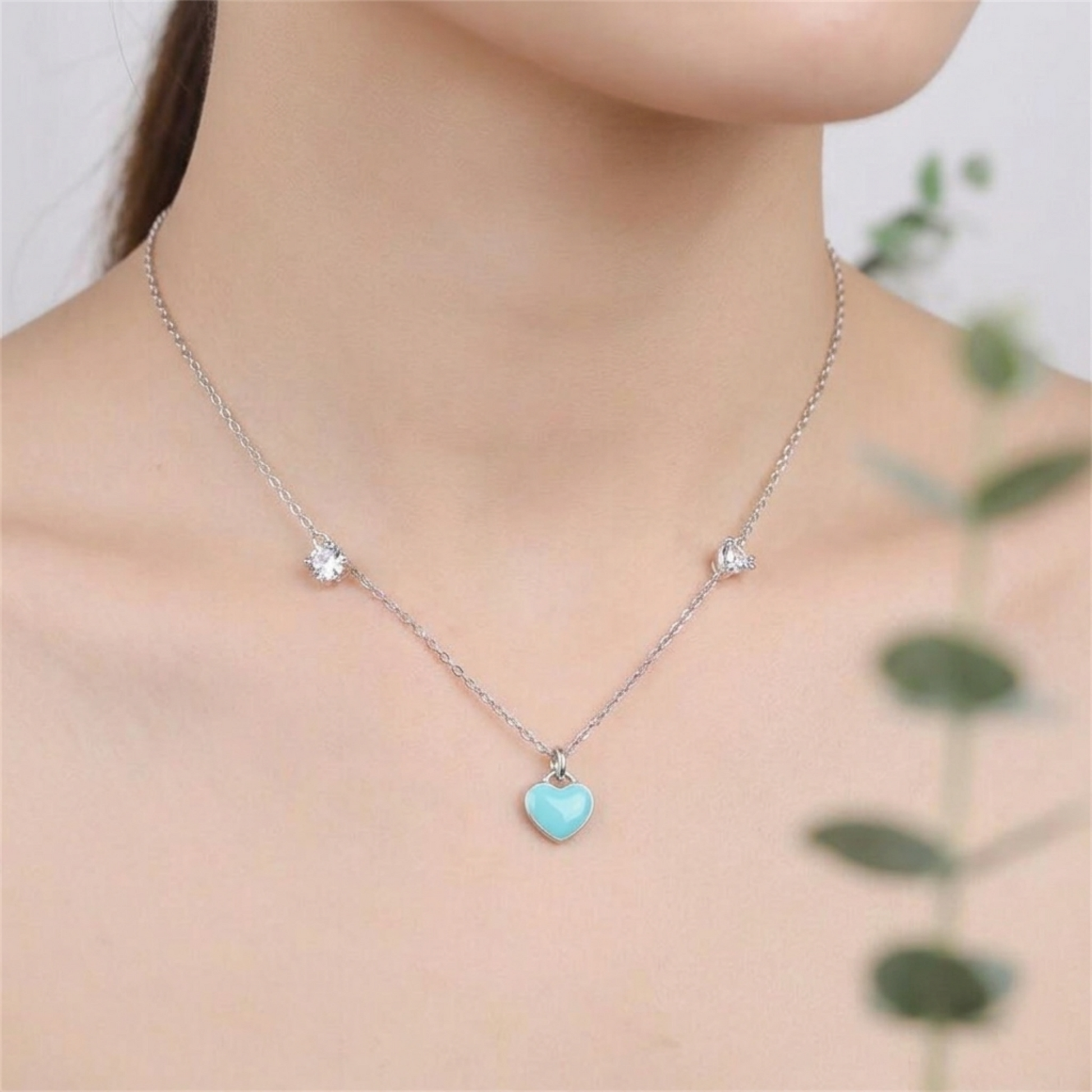 Turquoise heart charm on silver necklace chain with small hanging loop