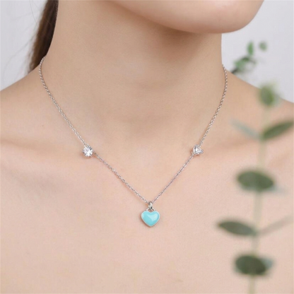 Turquoise heart charm on silver necklace chain with small hanging loop