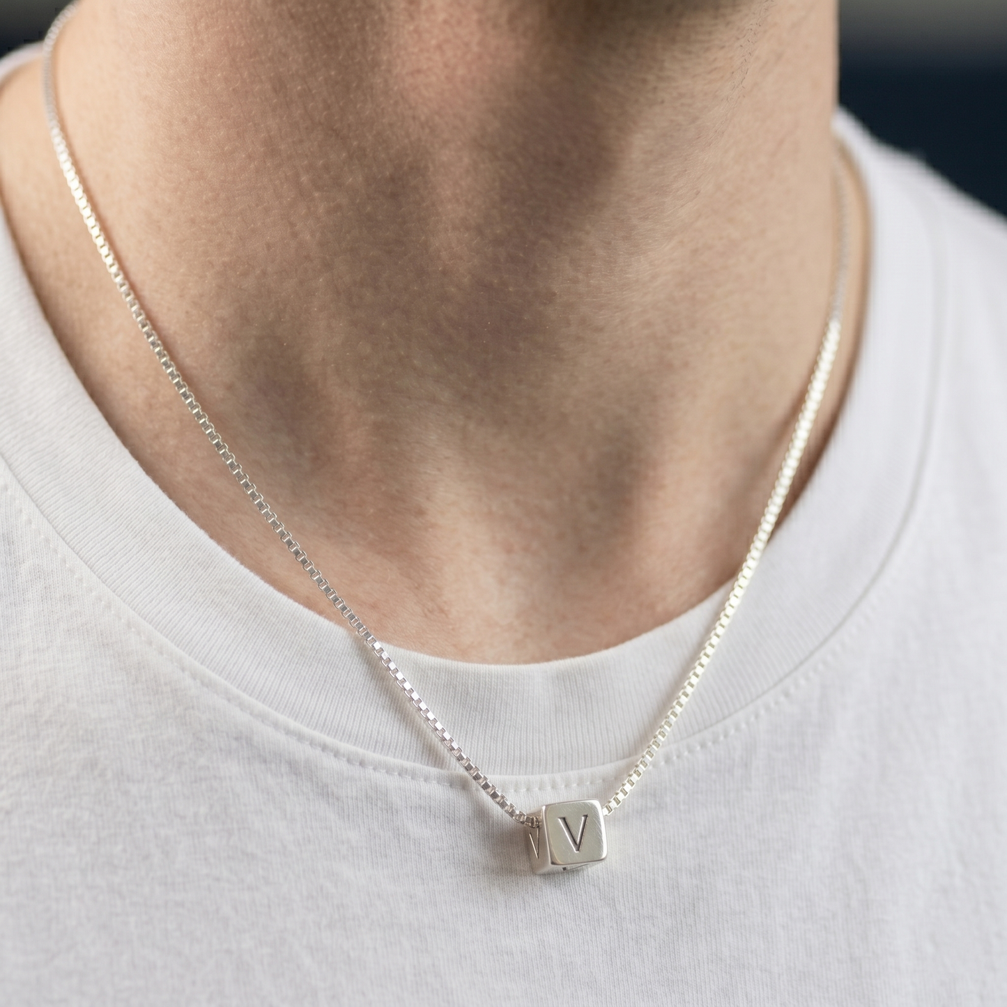 Silver chain necklace with cube pendant engraved V
