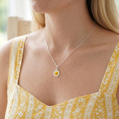 Sunflower pendant charm necklace with yellow glazed center and silver petals