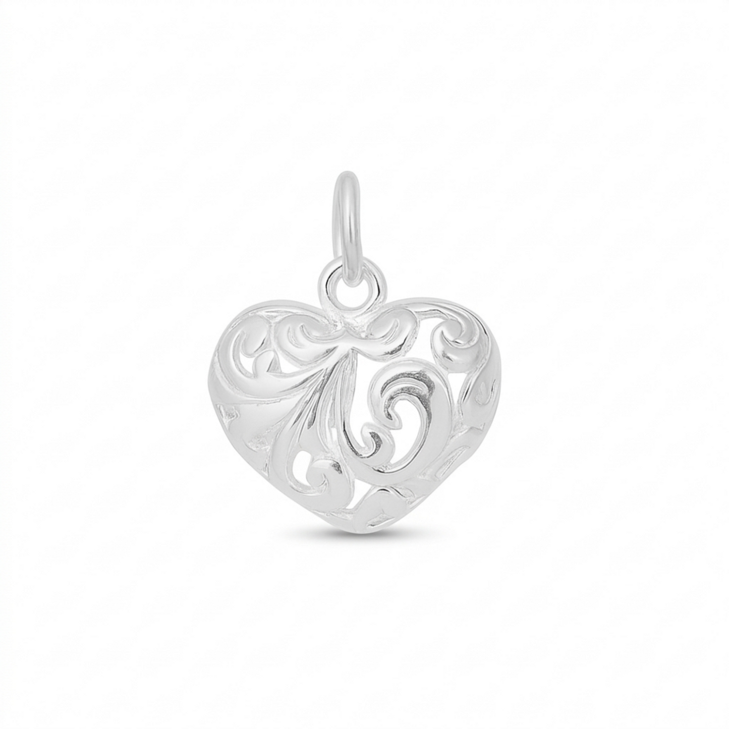 Silver heart pendant with filigree floral cutouts and top loop bail