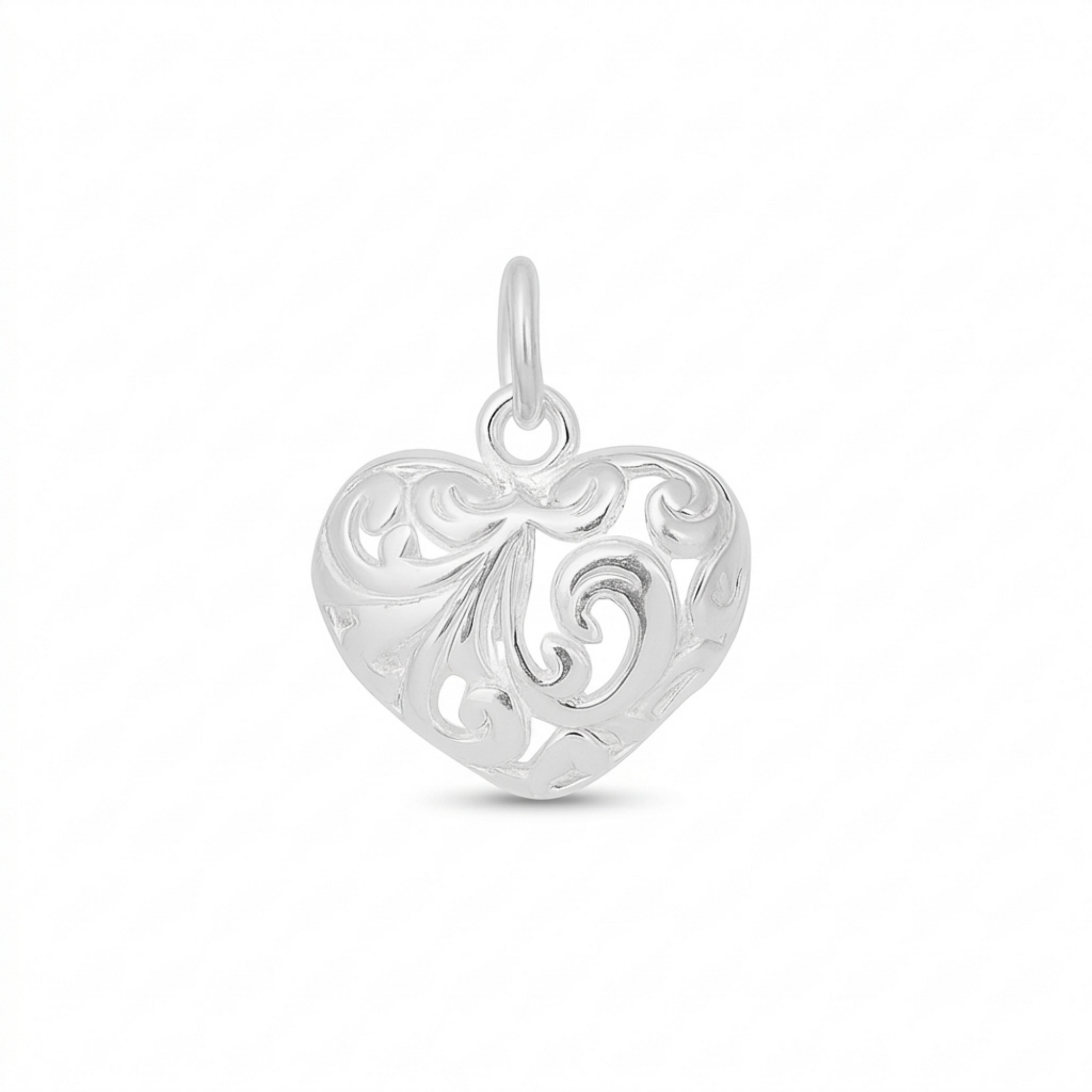 Silver heart pendant with filigree floral cutouts and top loop bail