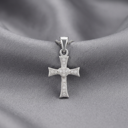 Silver heart-cross pendant with dangling bail and CZ pavé details