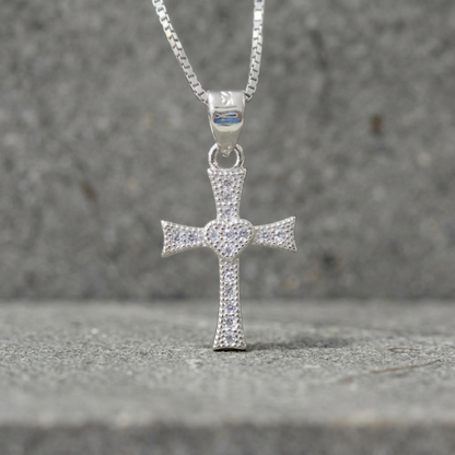 Silver heart cross pendant with CZ pavé, attached to silver chain