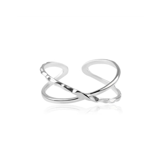 Silver criss-cross knot ring, isolated on white background