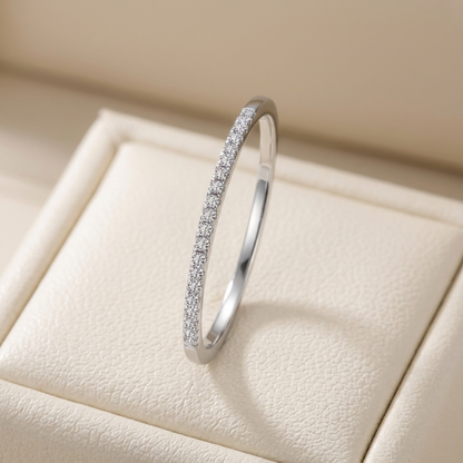 Rhodium pavé stack ring front view, full hoop covered in small stones.