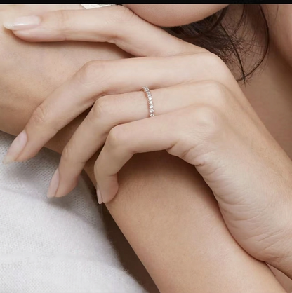 CZ eternity band ring, silver tone with small round clear stones