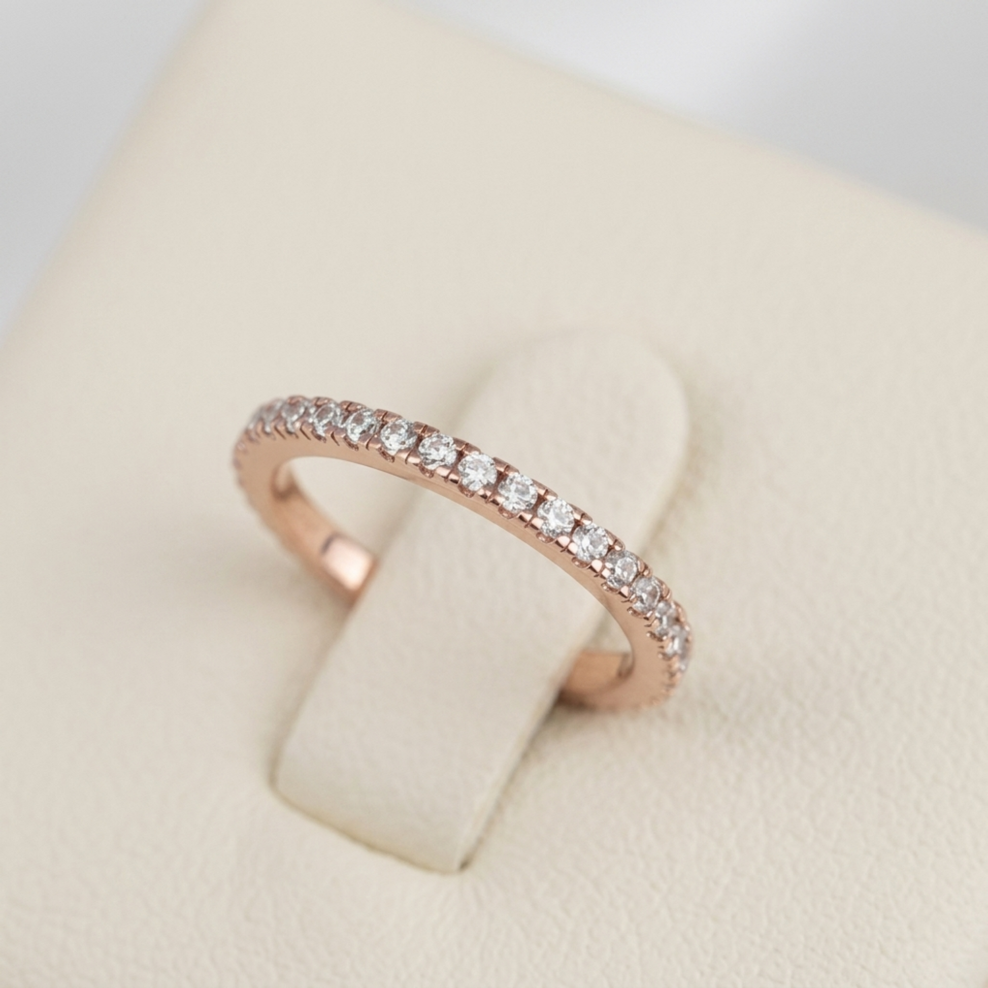 CZ stacking eternity band ring in rose gold tone with continuous round sparkle stones