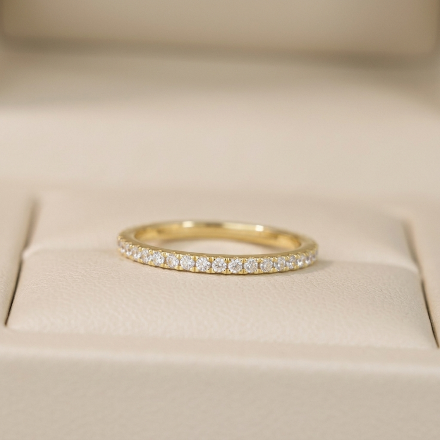 CZ stacking eternity band ring in gold tone with a full row of round sparkle stones