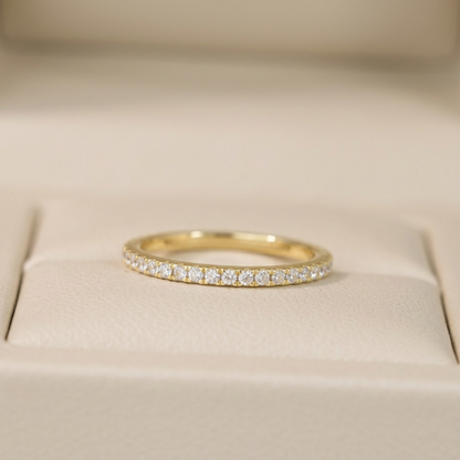 CZ stacking eternity band ring in gold tone with a full row of round sparkle stones