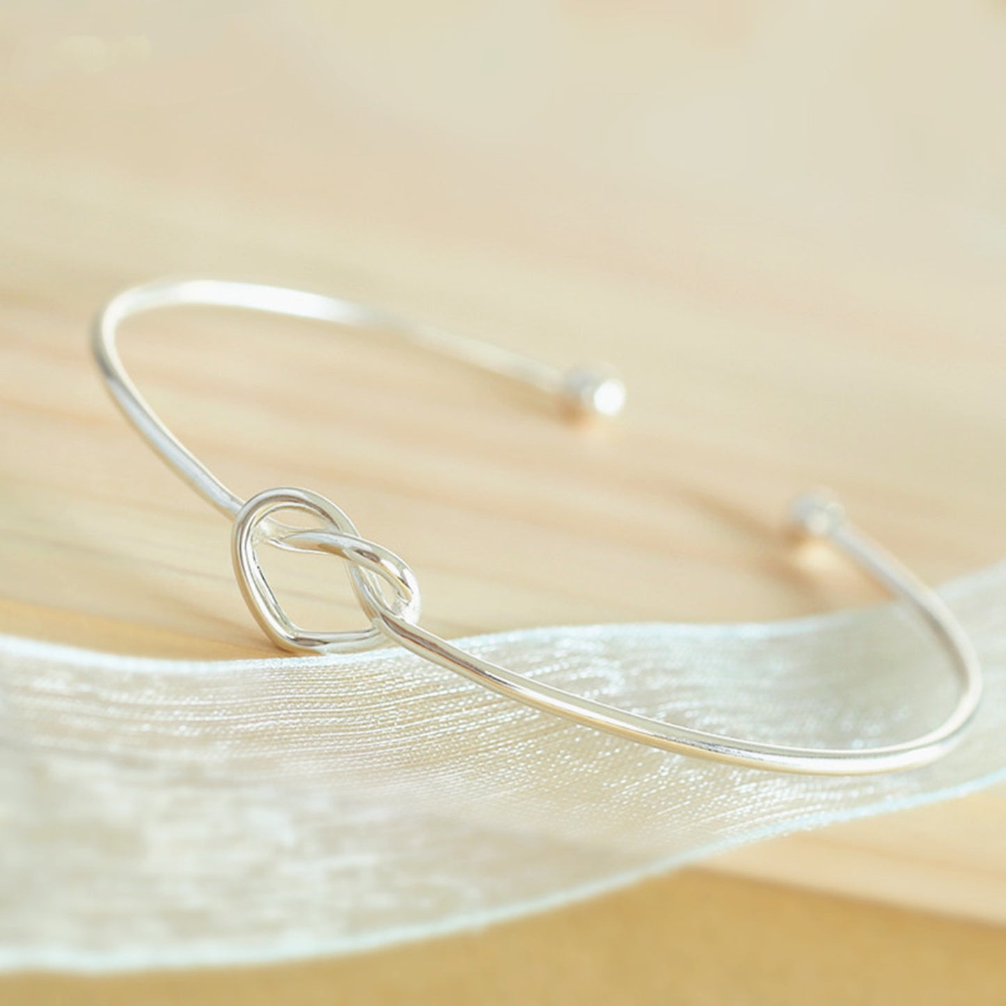 Love Knot Bangle Bracelet in Sterling Silver, 50 x 60mm | Adjustable bracelet - sugarkittenlondon