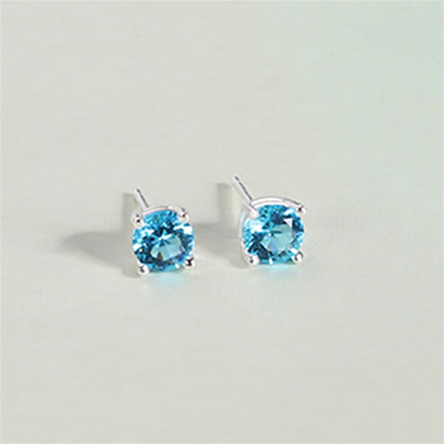 Sterling Silver 4 Claw Round 5mm CZ Stud Earrings Light Blue Aquamarine Clear White
