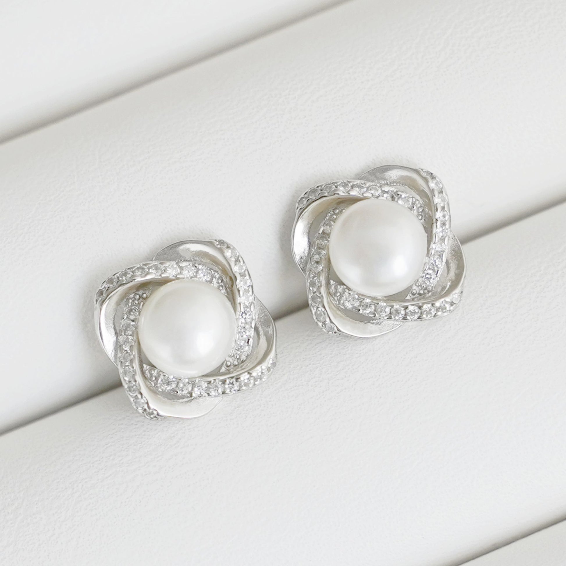 Sterling Silver Freshwater Pearl Stud Earrings with CZ Knots - 7mm White Button Pearls - sugarkittenlondon