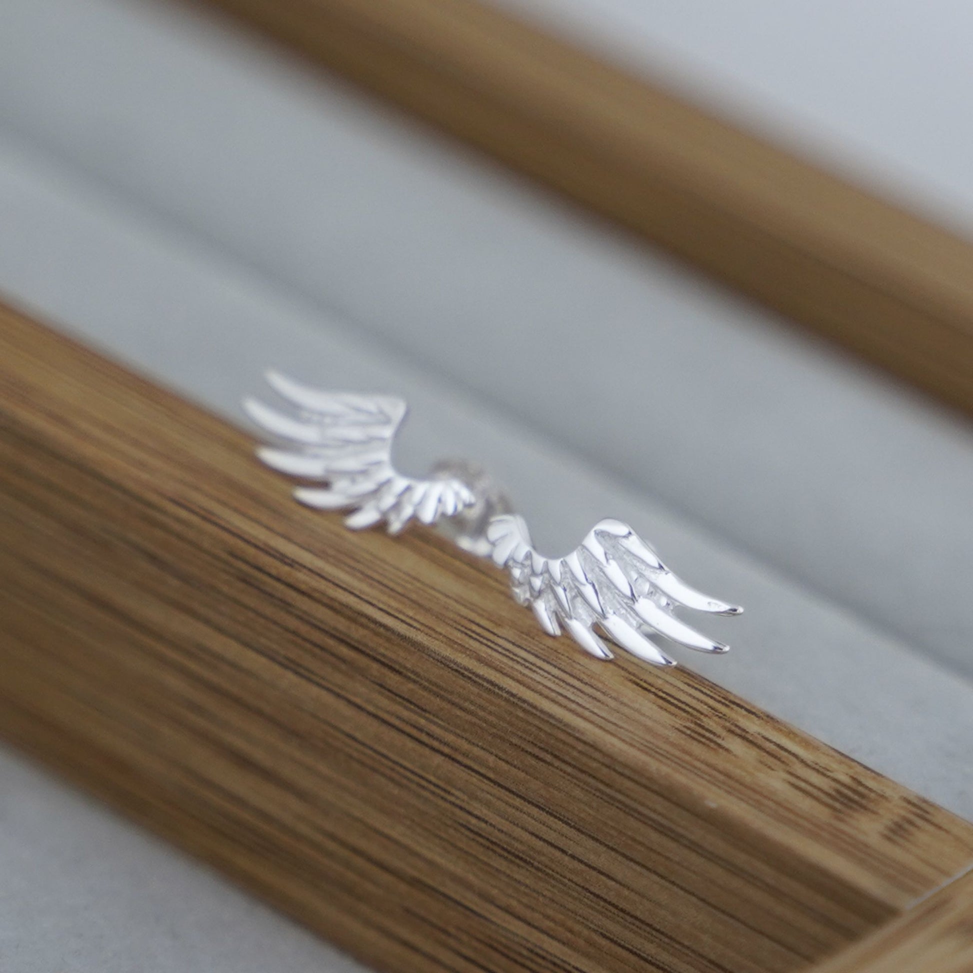 Sterling Silver Guardian Angel Wing Textured Feather Stud Earrings - sugarkittenlondon
