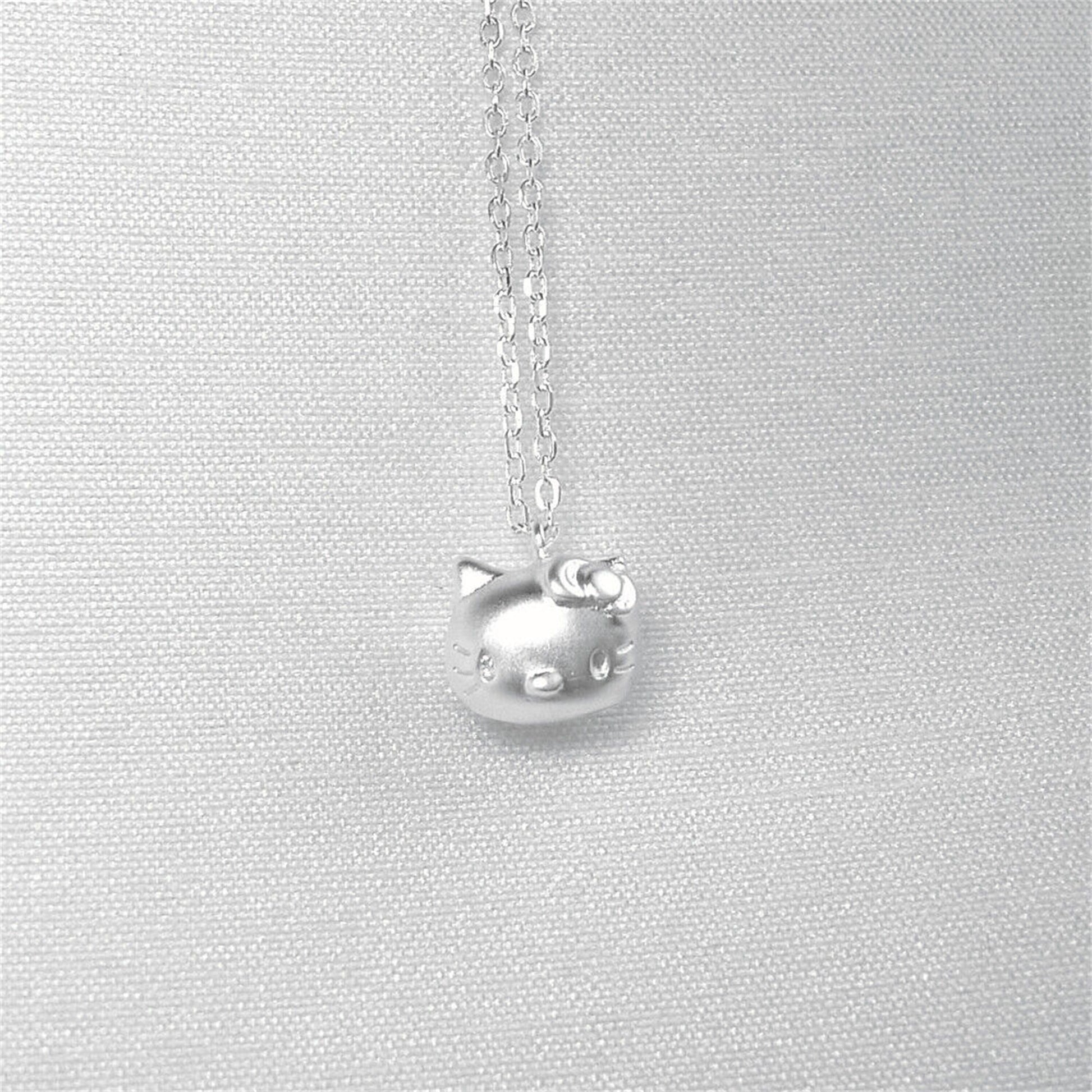 Sterling Silver Hello Kitty Necklace with Jingle Bell Charm - sugarkittenlondon