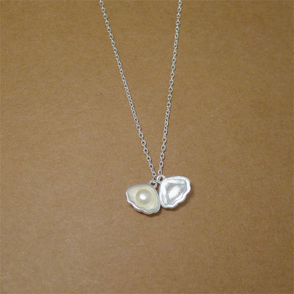 Sterling Silver 5mm Natural Freshwater Pearl in Shell Charm Necklace - sugarkittenlondon