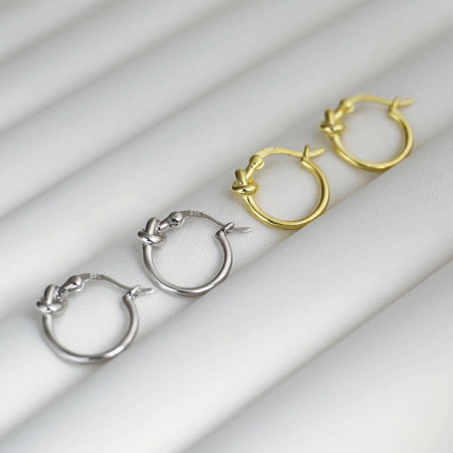 Sterling Silver Creole Hoop Earrings with Gold-plated Love Knot and French Lock - sugarkittenlondon