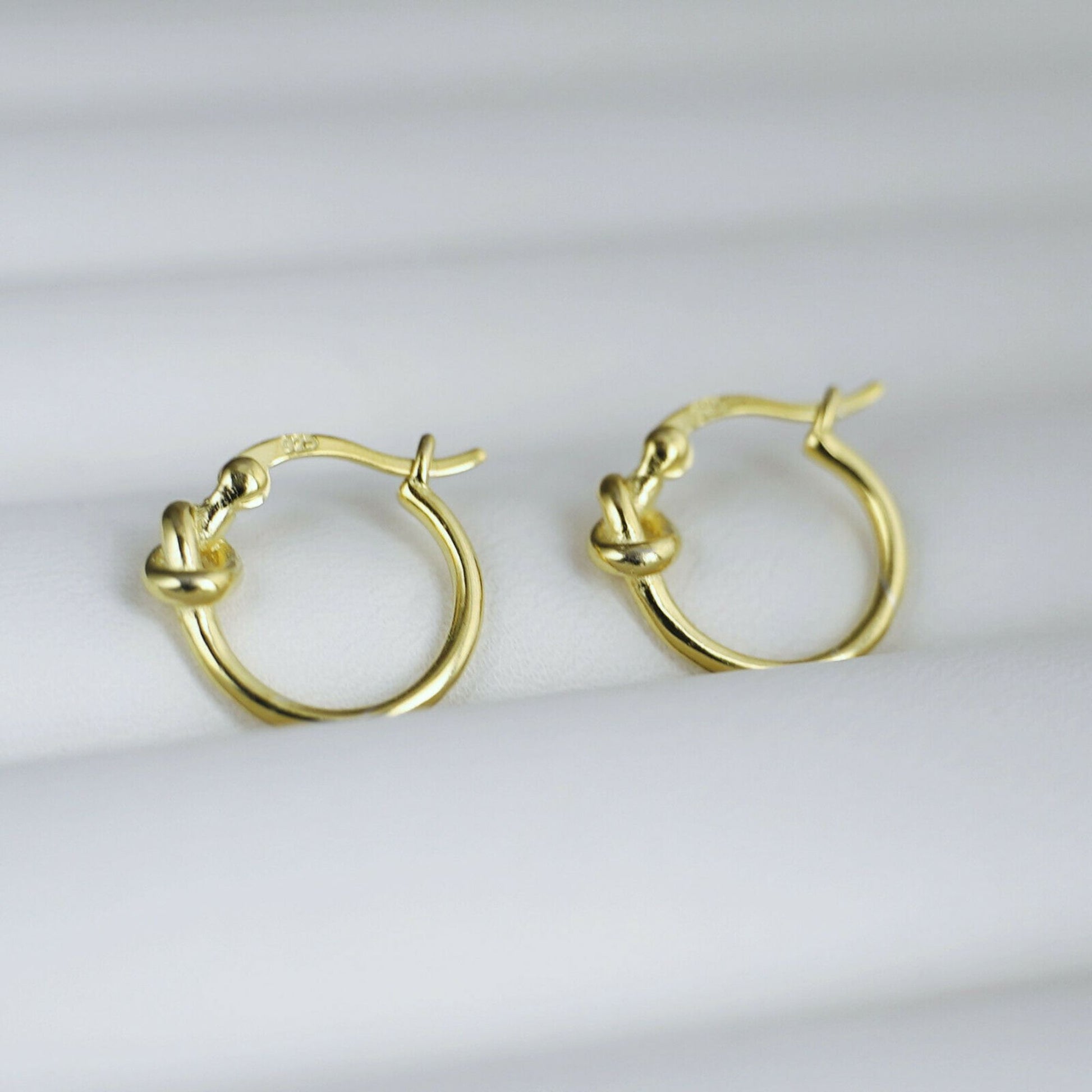 Sterling Silver Creole Hoop Earrings with Gold-plated Love Knot and French Lock - sugarkittenlondon