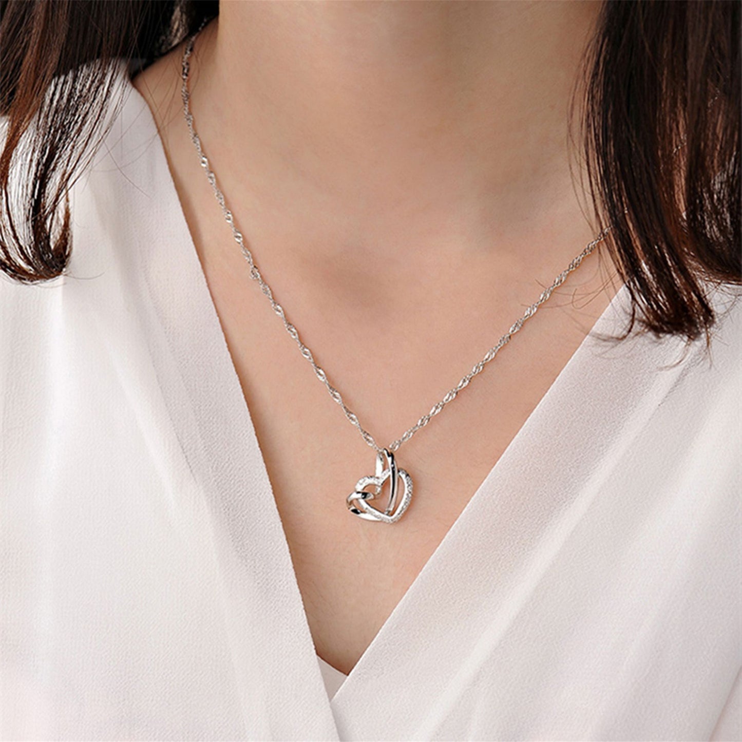 Sterling Silver Love Knot Necklace with Floating Sandblasted Heart Charm - sugarkittenlondon