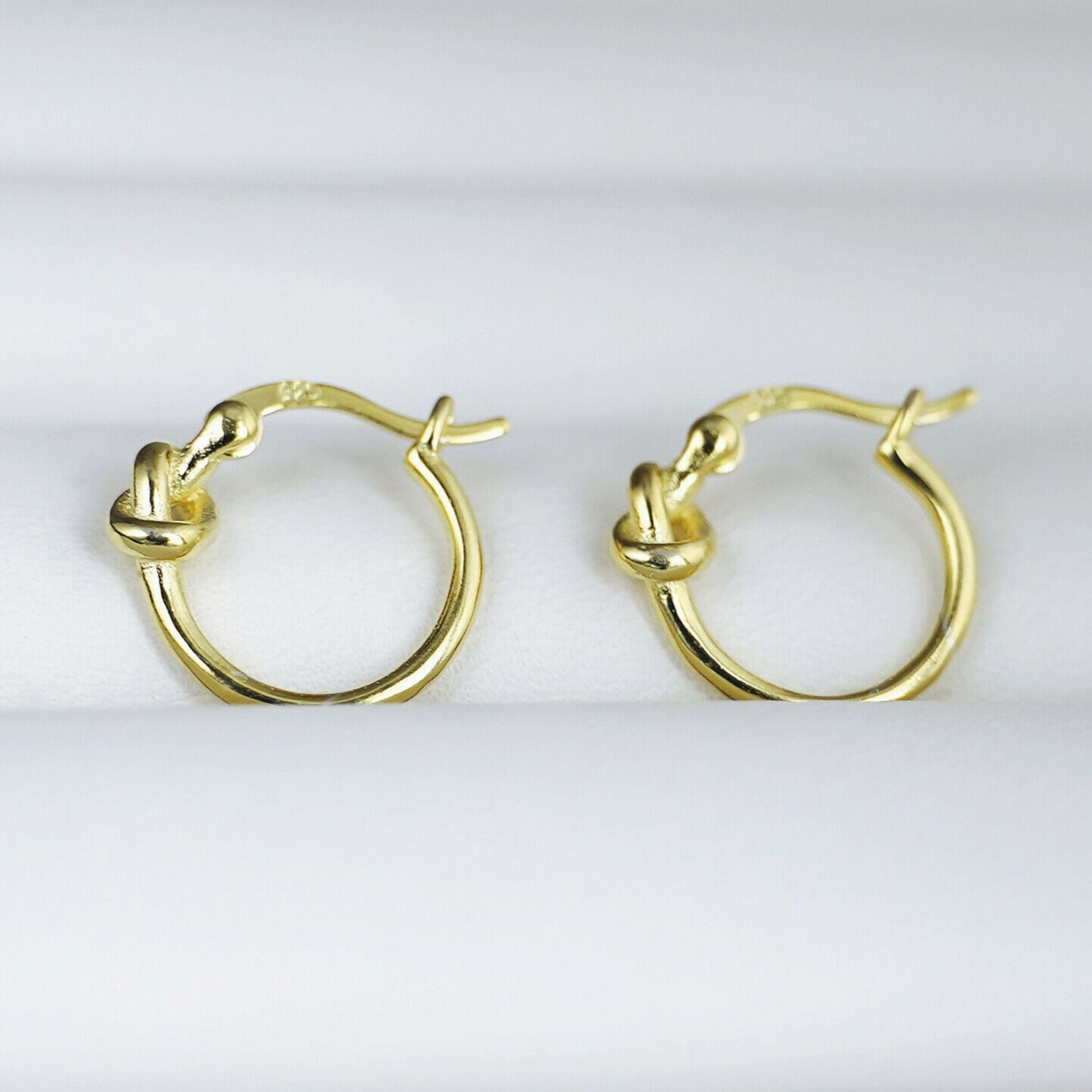 Sterling Silver Creole Hoop Earrings with Gold-plated Love Knot and French Lock - sugarkittenlondon