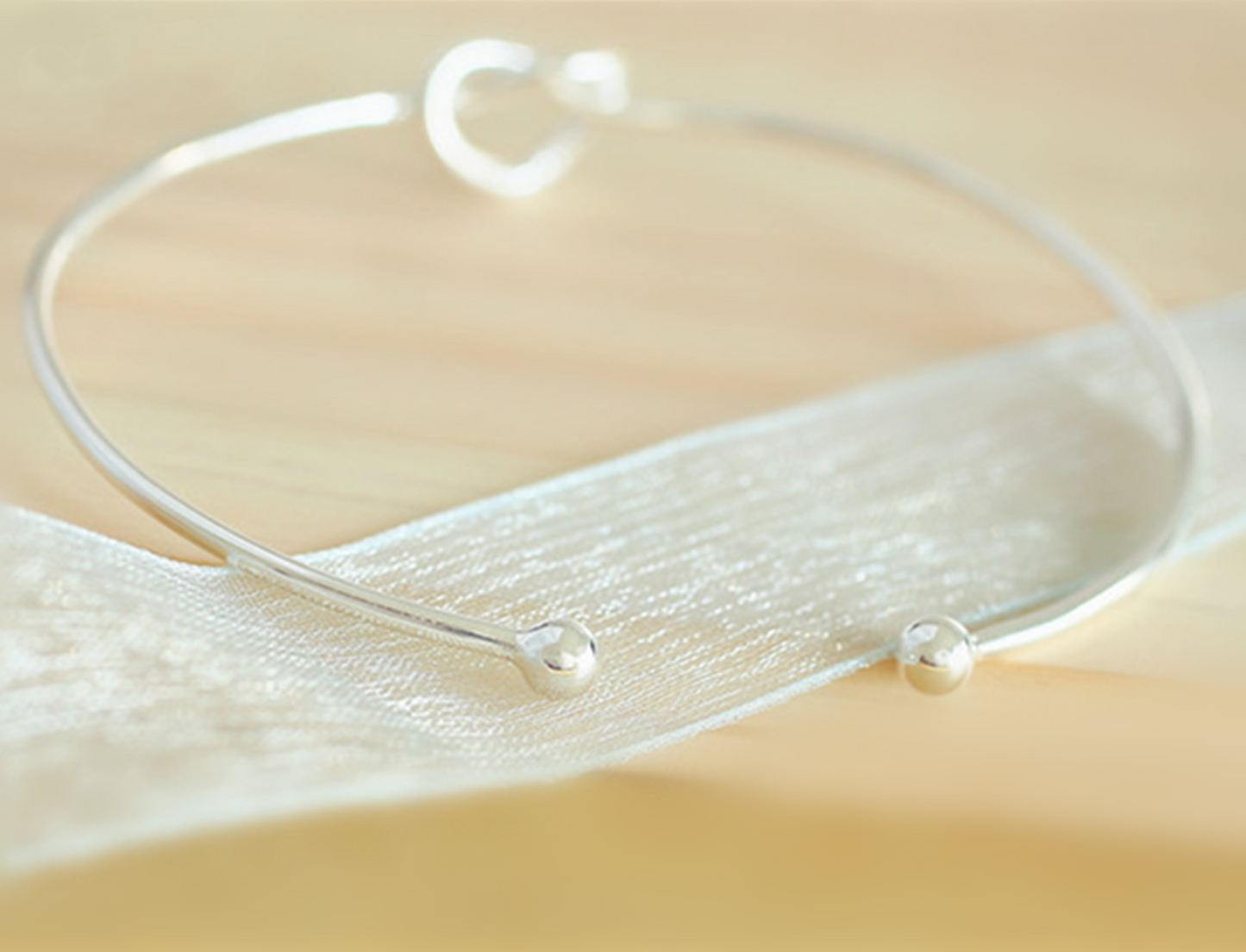 Love Knot Bangle Bracelet in Sterling Silver, 50 x 60mm | Adjustable bracelet - sugarkittenlondon