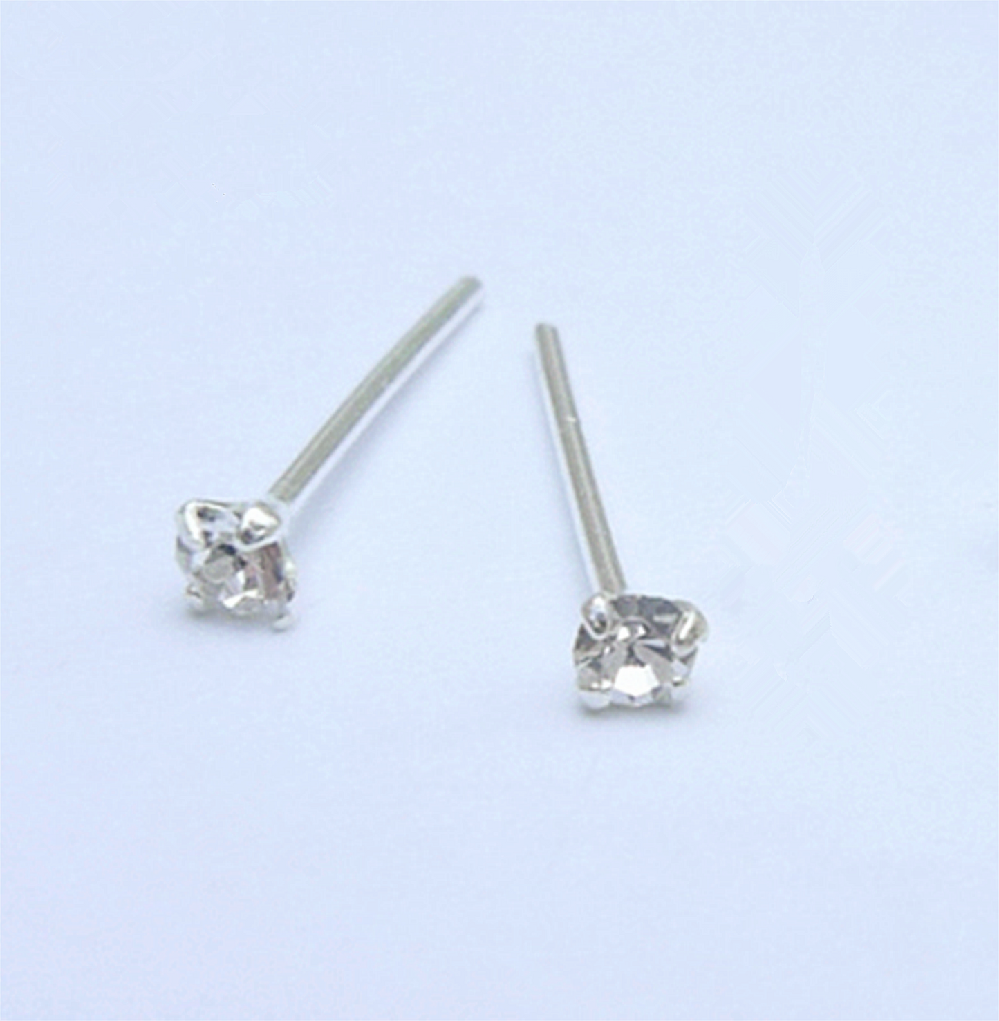 Sterling Silver 1.5mm Clear / Opal Round 4 Claw CZ Stud Earrings